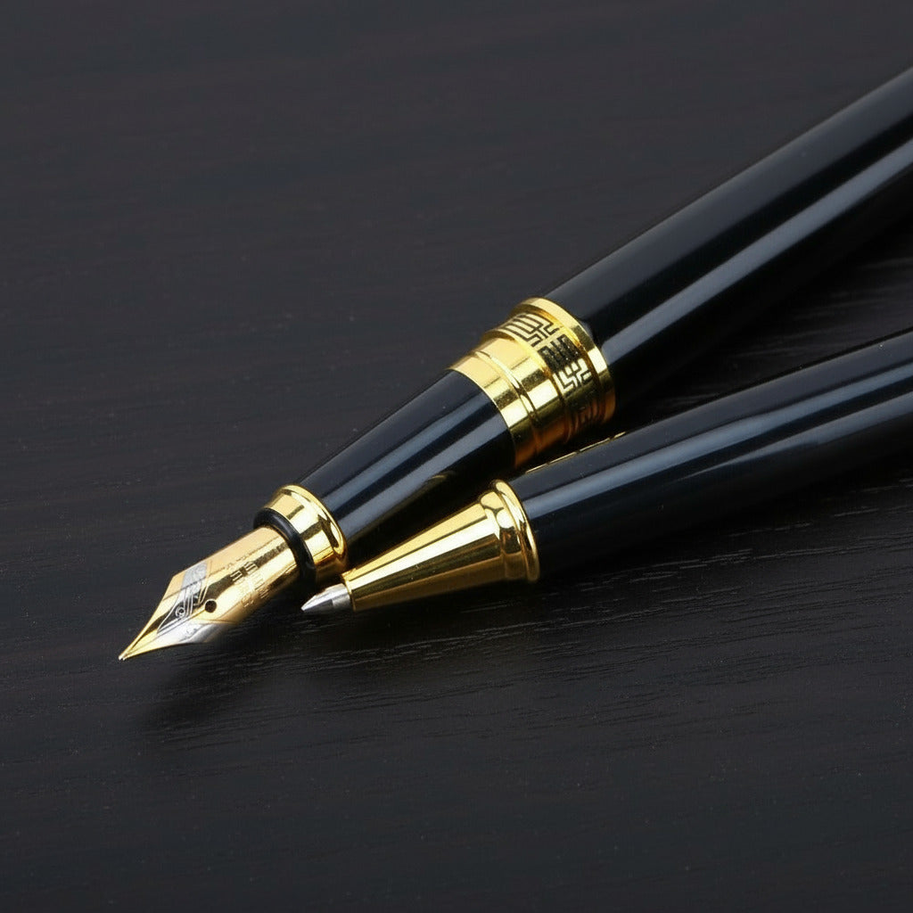 Fountain pen with gold accents on a dark wooden surface
