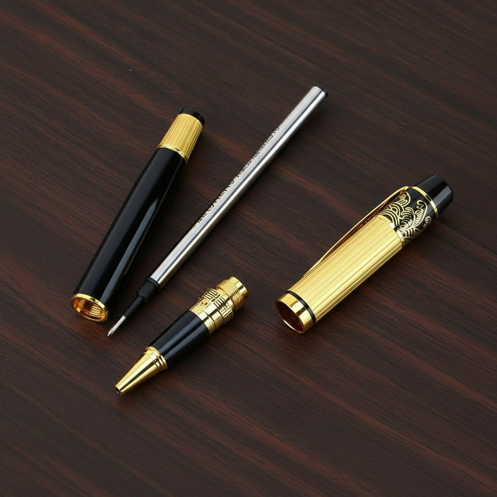 Set of decorative pens on a dark wooden surface with a gold and black design.