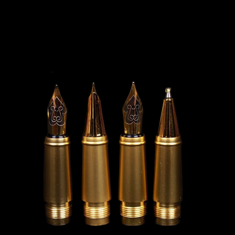 Set of four gold-colored fountain pen nozzles with labeled tip sizes on a black background