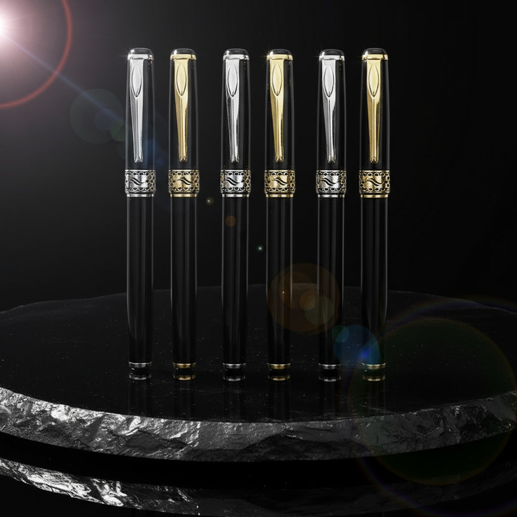 Set of six black pens with gold and silver accents on a black background