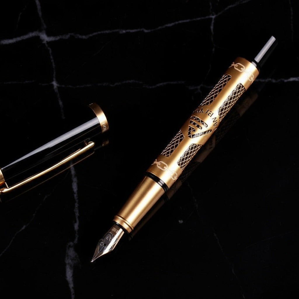 Gold fountain pen with intricate design on a black background