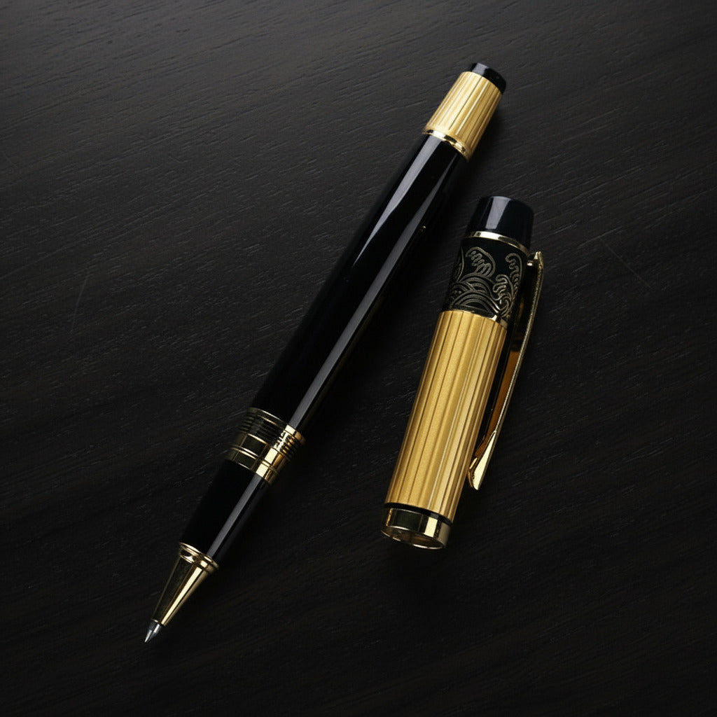 Black and gold pen on a dark wooden background