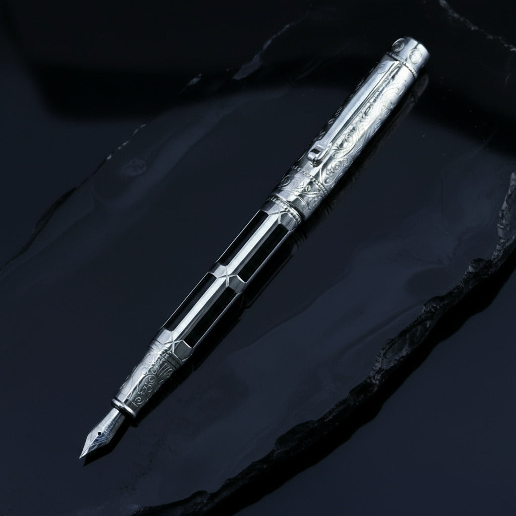 Decorative pen with gold accents on a black background